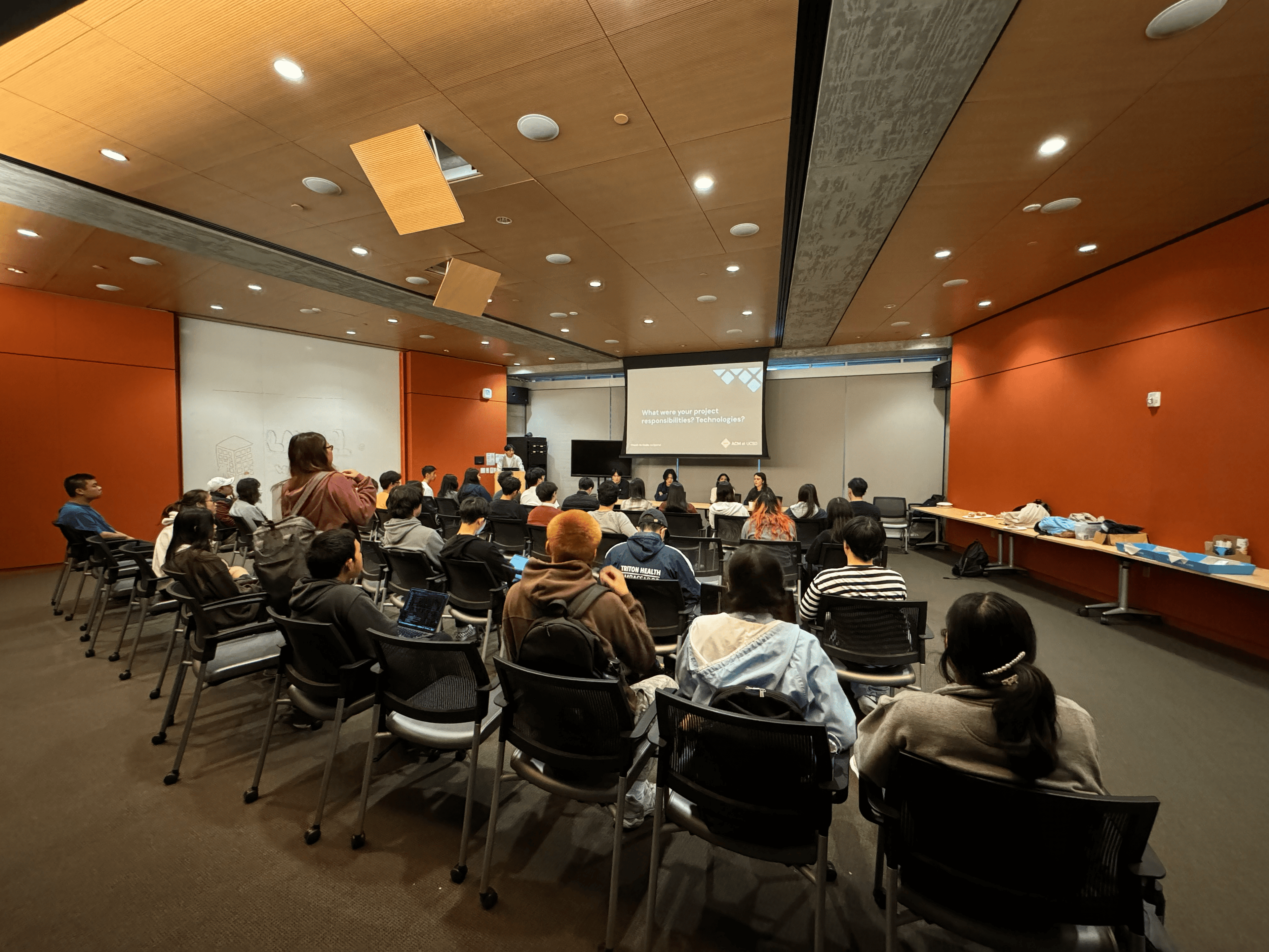 members consider what their project responsibilities and technologies are at a Hack Event